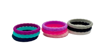 Load image into Gallery viewer, stackable women&#39;s braided silicone rings in different colors (purple, pink, and black) displayed on a white background.
