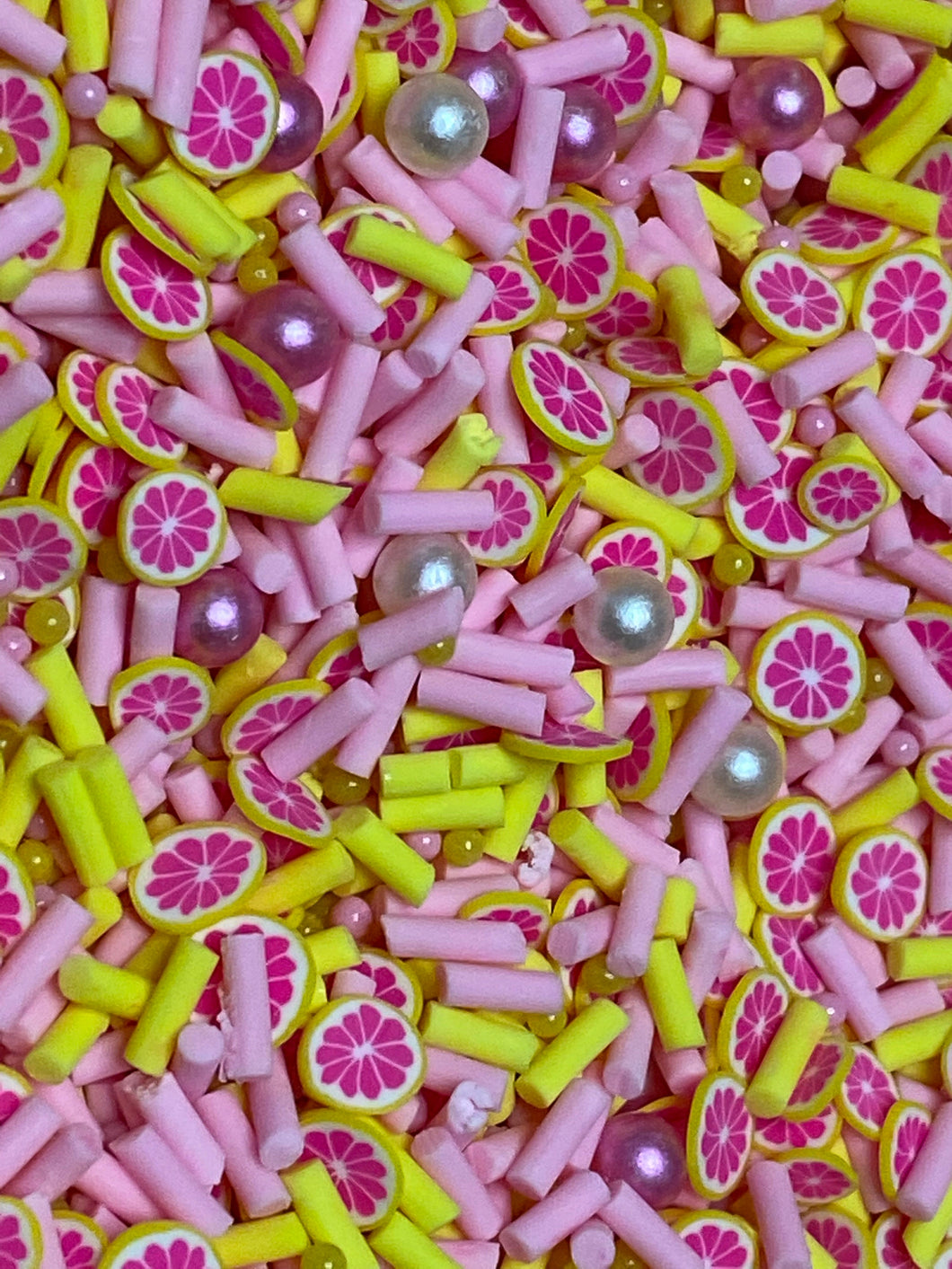 Grapefruit Clay Sprinkles and pearls   5mm.  0.5 oz bag