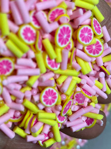 Grapefruit Clay Sprinkles and pearls   5mm.  0.5 oz bag