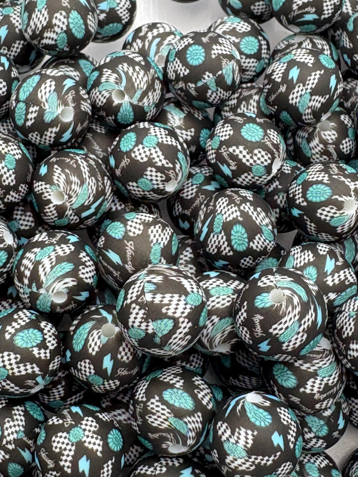 Turquoise and Black Bow Silicone Beads